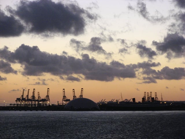 North-west facing view of the harbor and port at dusk