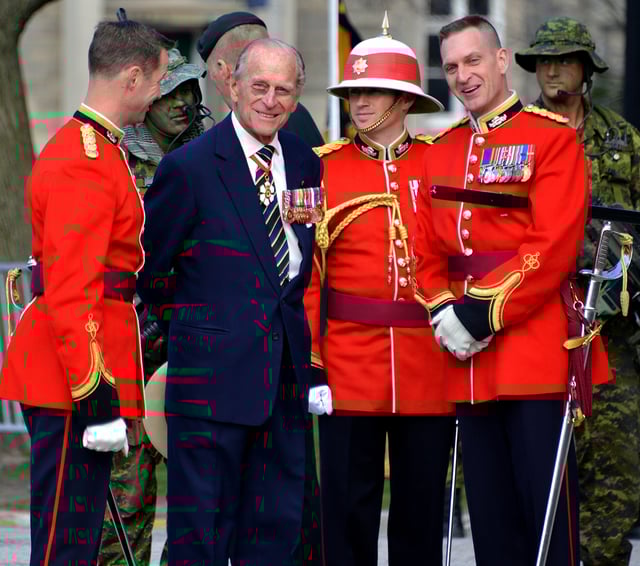The Duke of Edinburgh, Colonel-in-Chief of the Royal Canadian Regiment, presenting the 3rd Battalion with their Regimental Colours in April 2013