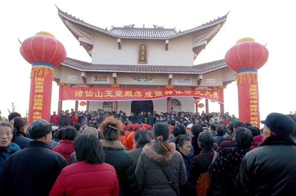 People forgather for a worship ceremony at an ancestral shrine in Hong'an, Hubei.