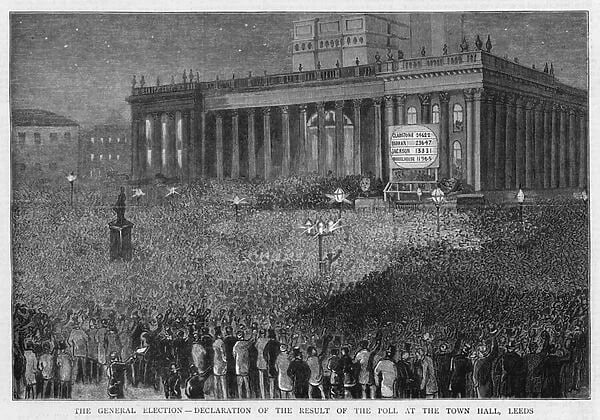 A crowd waits outside Leeds Town Hall to see them elect a Liberal Party candidate during the 1880 general elections.