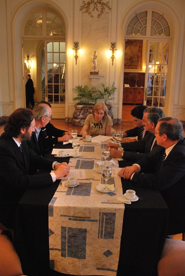 Uruguayan officials conversing at a meeting at the Palacio Taranco, 6 November 2010