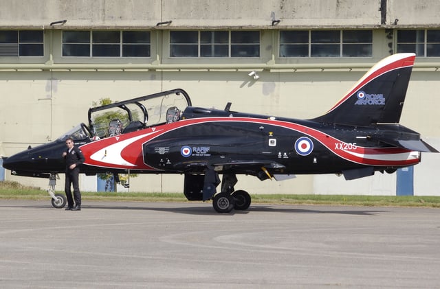 A Royal Air Force Hawk T1A at Kemble Airport, Gloucestershire, with its pilot