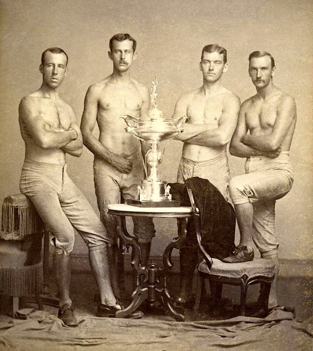 Yale's four-oared crew team, posing with 1876 Centennial Regatta trophy, won at Philadelphia