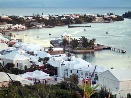 St. George's town, in the Islands of Bermuda, or "The Somers Isles". The colony was founded by the wrecking of the flagship of the Virginia Company in 1609. The Company's charter was extended to include Bermuda in 1612, and it has remained a British colony ever since. Since the rebellion of Virginia, it has been the oldest-remaining British colony, and the town of St. George's is the oldest continuously inhabited British settlement in the New World.