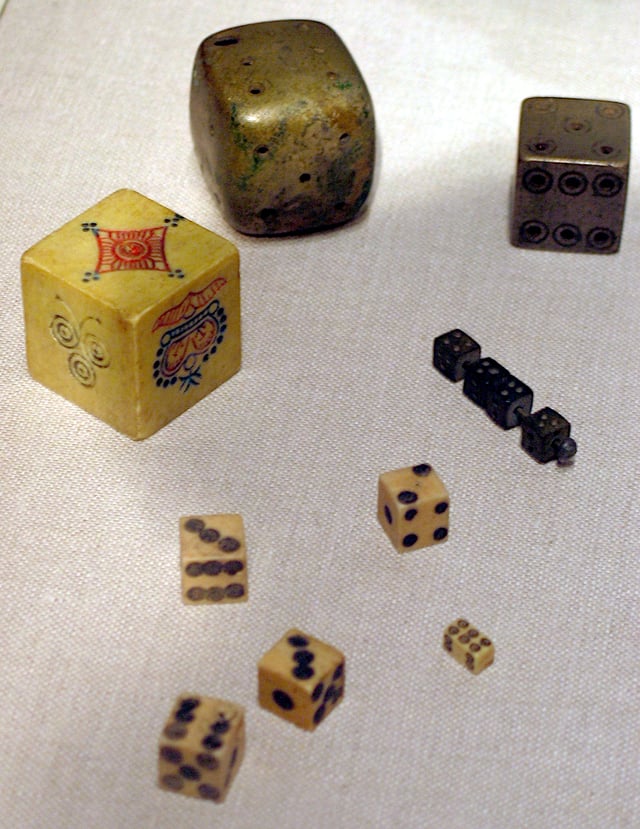 A collection of historical dice from various regions of Asia