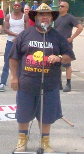 Aboriginal activist Sam Watson addressing Invasion Day Rally 2007 in a "Australia has a Black History" T-shirt