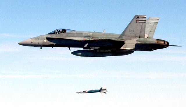 Canadian CF-18 Hornet drops a laser-guided bomb