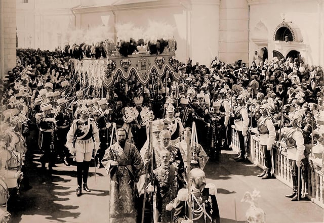After his coronation, Nicholas II leaves Dormition Cathedral. The Chevalier Guard Lieutenant marching in front to the Tsar's right is Carl Gustaf Mannerheim, later President of Finland.