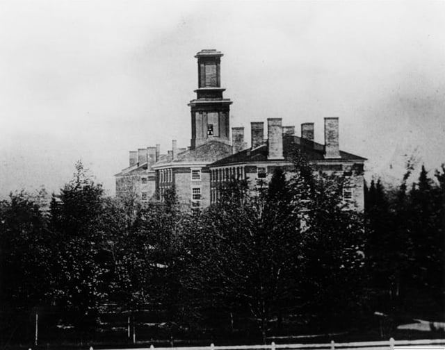 The oldest known photograph of Colby, a daguerreotype taken in 1856 of the three central buildings on campus: South College, Recitation Hall, and North College