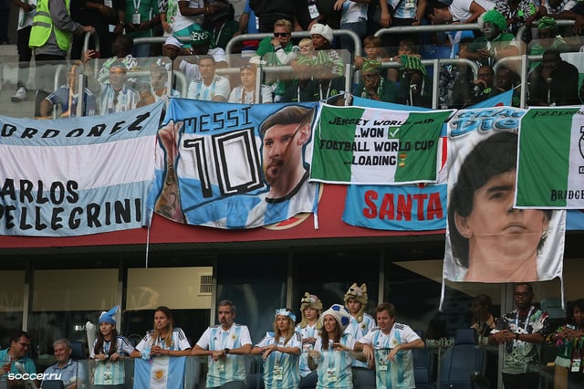 Argentina fans with Messi and Maradona banners at the 2018 World Cup in Russia
