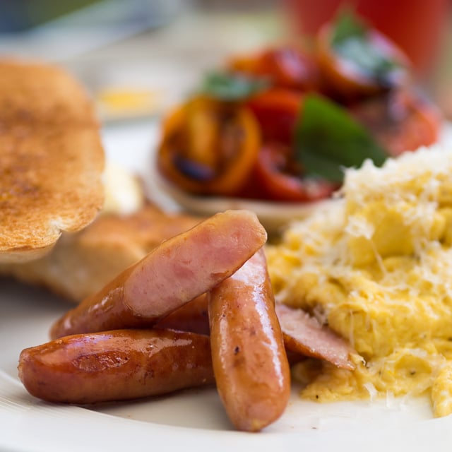 Japanese arabiki pork sausages served with scrambled eggs in a restaurant in Chiang Mai, Thailand