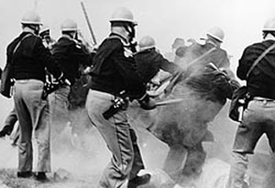 Police attack non-violent marchers on "Bloody Sunday", the first day of the Selma to Montgomery marches.