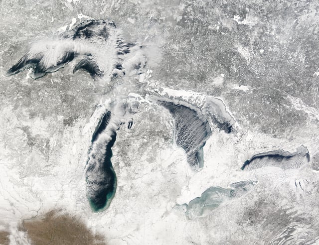 Terra MODIS image of the Great Lakes, January 27, 2005, showing ice beginning to build up around the shores of each of the lakes, with snow on the ground.