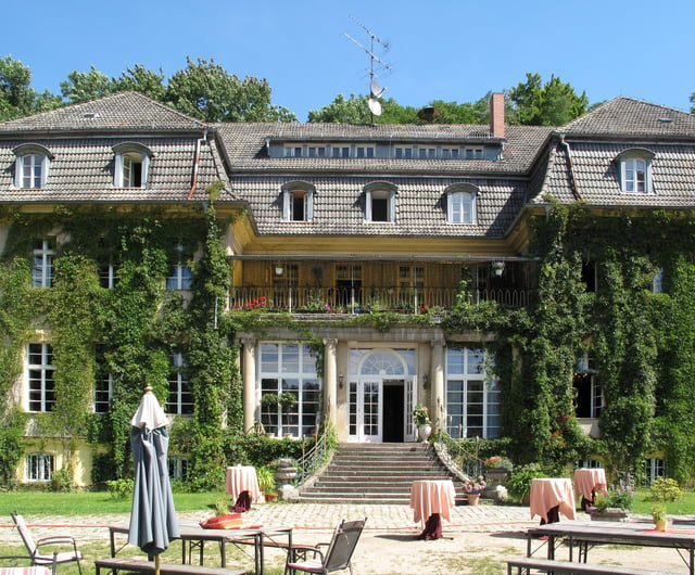 "Haus Tornow am See" (former manor house), Germany from 1912 is today separated into a special education school and a hotel with integrated work/job- and rehabilitation-training for people with mental disorders