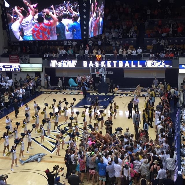 Fans storming the court after the GW Colonials defeated the Virginia Cavaliers in 2015.
