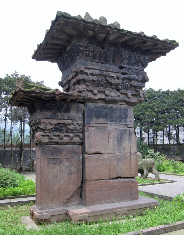 A stone-carved gate pillar, or que, 6 metres (20 ft) in total height, located at the tomb of Gao Yi in Ya'an, Sichuan, built during the Eastern Han dynasty (25–220 CE)