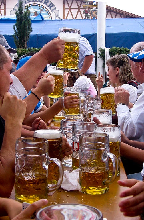 Maßkrüge, one litre beer mugs, during the 2006 Oktoberfest in Germany