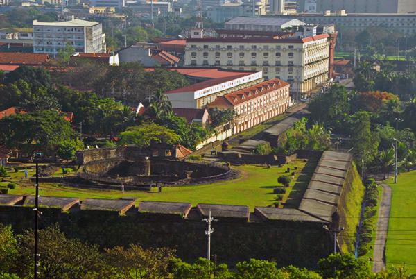 The campus of the University of the City of Manila and Baluarte de San Diego in Intramuros.