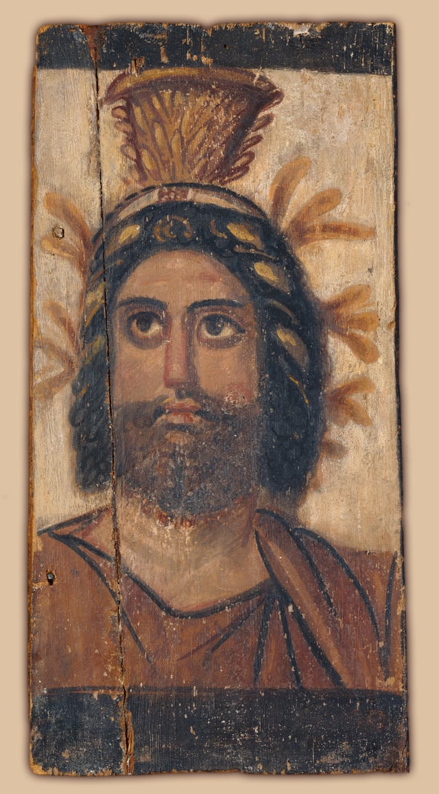 Painted wood panel depicting Serapis, who was considered the same god as Osiris, Hades, and Dionysus in Late Antiquity. 2nd century AD.