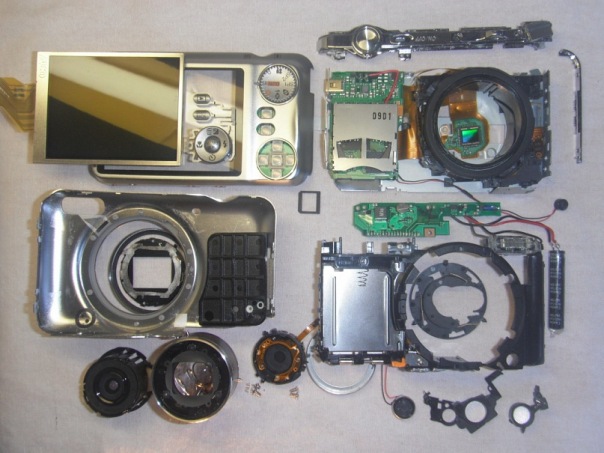 Disassembled compact digital camera