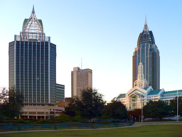 Downtown in 2008, as seen from Cooper Riverside Park. Buildings include (L to R): Renaissance Mobile Riverview Plaza Hotel, RSA–BankTrust Building, Arthur C. Outlaw Convention Center, and the RSA Battle House Tower.