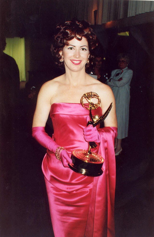 Actress Dana Delany holding a Primetime Emmy Award in 1992