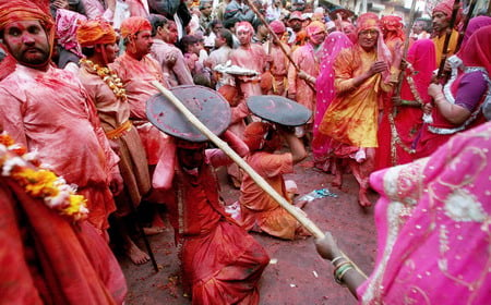 In the Braj region of North India, women have the option to playfully hit men who save themselves with shields; for the day, men are culturally expected to accept whatever women dish out to them. This ritual is called Lath Mar Holi.