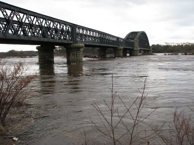 The River Spey in spate at the Garmouth old rail bridge