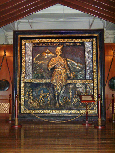 The bronze mural of the legendary Malay warrior, Hang Tuah with his renowned quote Ta' Melayu Hilang Di-Dunia (Malay for "Never shall the Malays vanish from the face of the earth") written on the top. The quote is a famous rallying cry for Malay nationalism.