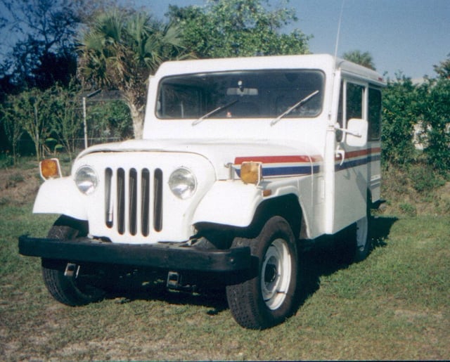 A USPS mail delivery vehicle made by Jeep