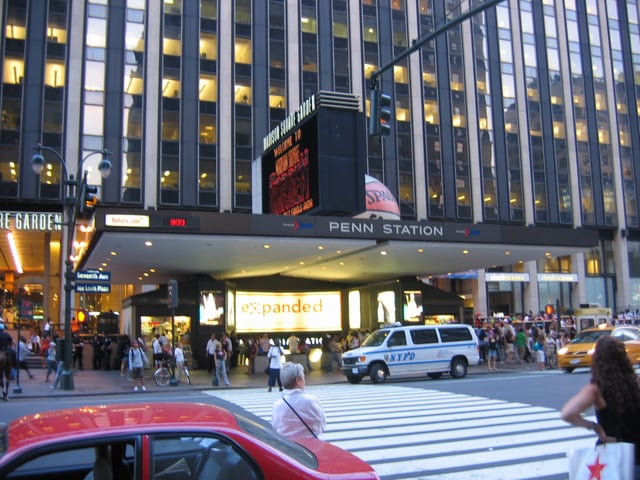 Penn Station in Midtown Manhattan, New York City, is an important railway terminal and transfer hub as well as the busiest railroad station in the Western Hemisphere, serving more than 430,000 commuter rail and Amtrak passengers a day as of 2018.