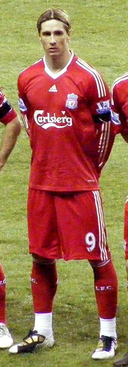 Torres lines up before a Liverpool match in 2010