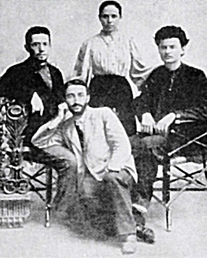 Trotsky's first wife Aleksandra Sokolovskaya with her brother (sitting on the left) and Trotsky (sitting on the right) in 1897