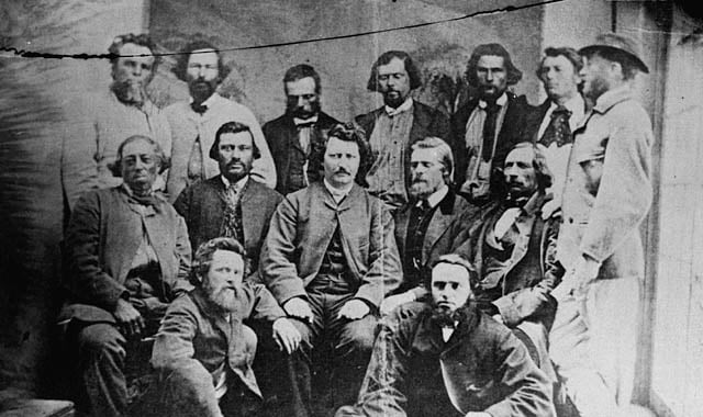 Councillors of the Métis Provisional Government, 1870. Louis Riel sits in the centre.