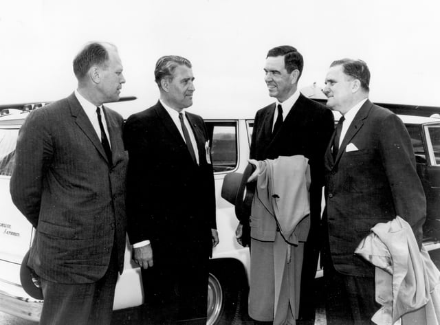Congressman Gerald Ford, MSFC director Wernher von Braun, Congressman George H. Mahon, and NASA Administrator James E. Webb visit the Marshall Space Flight Center for a briefing on the Saturn program, 1964.