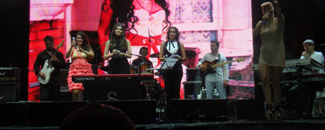 Romanian singers Rona Hartner, Paula Seling, Nico and Maria Radu performing at a memorial Amy Winehouse concert in Bucharest on 23 October 2011