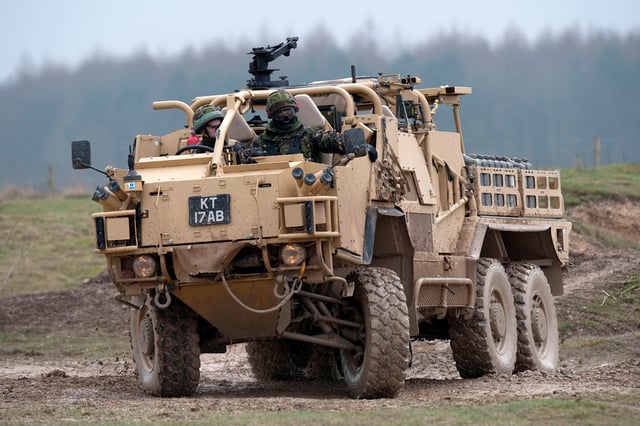 Members of 1st The Queen's Dragoon Guards under training to operate the Coyote vehicle