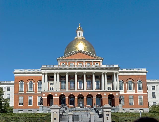 The Massachusetts State House, topped by its golden dome, faces Boston Common on Beacon Hill.