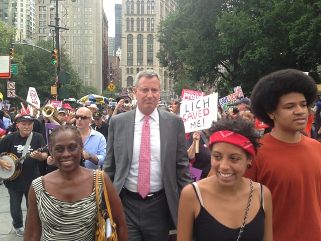 Bill de Blasio with his wife, Chirlane (left), and two children at a rally in New York City in 2013