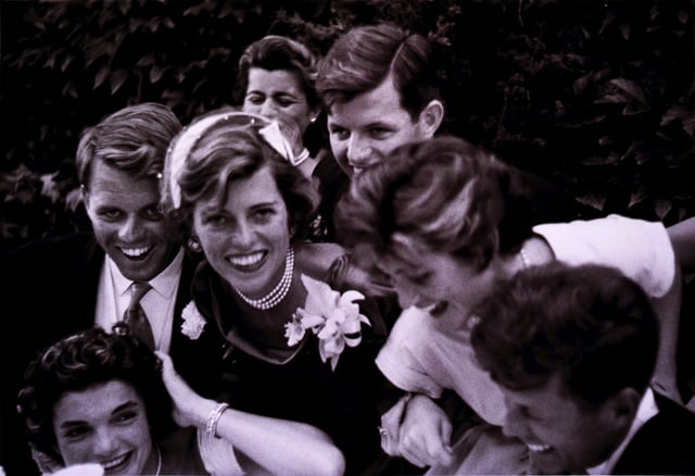 The newlyweds are surrounded by Jack's siblings on their wedding day in Newport, Rhode Island, 1953
