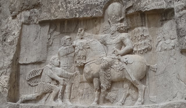 A bas-relief at Naqsh-e Rostam, depicting the victory of Sasanian ruler Shapur I over Roman ruler Valerian