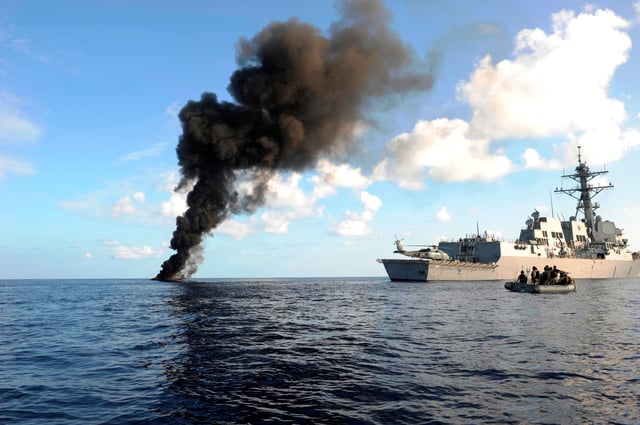 USS Farragut destroying a Somali pirate skiff in March 2010