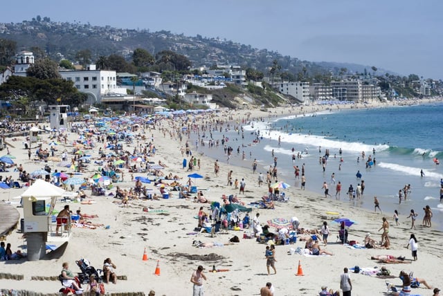 Beachgoers at Main Beach in Laguna Beach