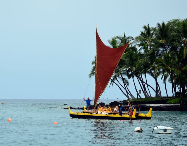 A wa'a kaulua (double-hulled canoe) from Hawai'i. Catamarans were one of the early technological innovations of Austronesian peoples that allowed them to colonize the islands of the Indo-Pacific and introduce coconuts and other canoe plants along their migration routes.