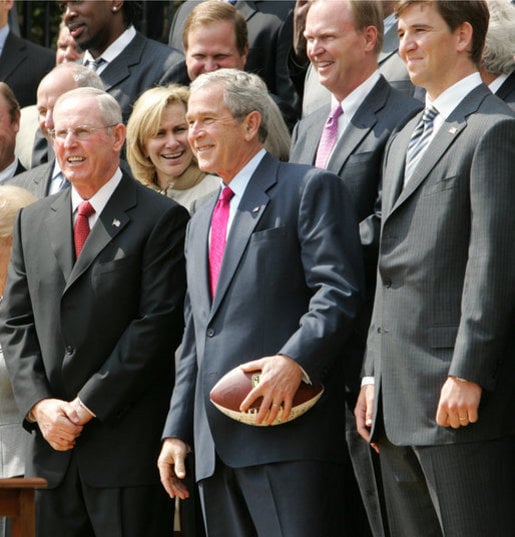 Manning (right) and Coach Tom Coughlin (left) with President Bush on April 30, 2008