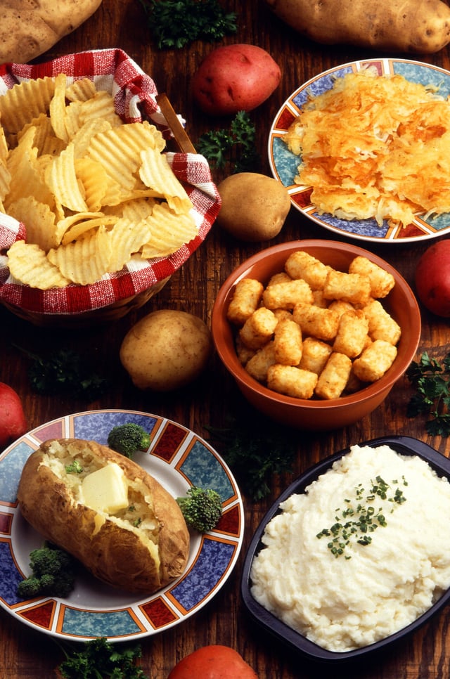 Various potato preparations: (clockwise from top left) potato chips, hashbrowns, tater tots, mashed potato, and a baked potato