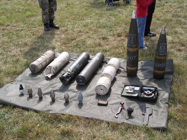 Modern 155 mm artillery ammunition – these shells are unusual in having two driving bands. The shell on the right is a modified M107.