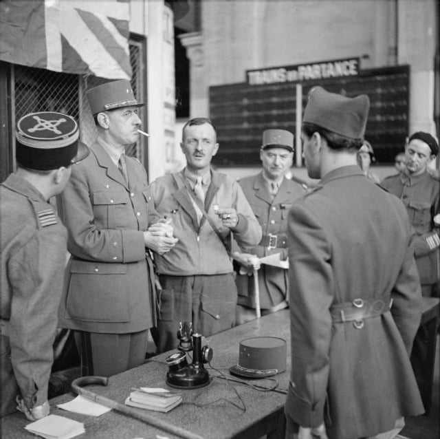 General de Gaulle with General Leclerc and other French officers at Montparnasse railway station in Paris, 25 August 1944