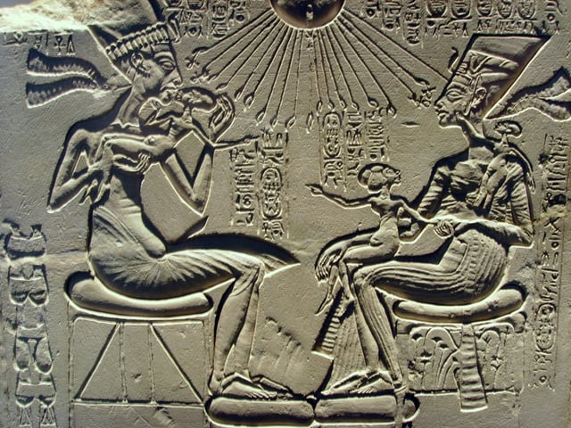 A sunk-relief depiction of Pharaoh Akhenaten with his wife Nefertiti and daughters. The main background has not been removed, merely that in the immediate vicinity of the sculpted form. Note how strong shadows are needed to define the image.