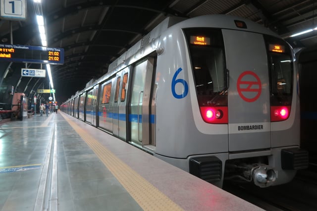 Coaches of Delhi Metro are color-coded to indicate different service lines.